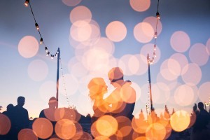 bride and groom under stars